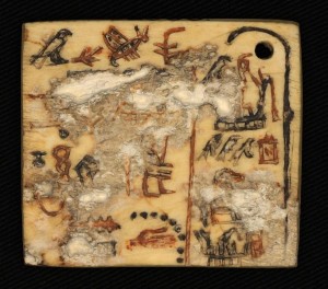 Ivory funerary label inscribed Ivory funerary label inscribed with early Egyptian hieroglyphs. 1st Dynasty (c.2900BCE) | Photo: Kathryn Piquette courtesy Trustees of the British Museum.